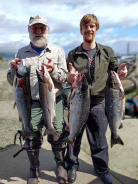 Two Anglers Show Off Their Salmon Haul